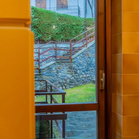 Апартаменты Casa Julie - Accogliente Rifugio Nella Quiete - Cour 0157